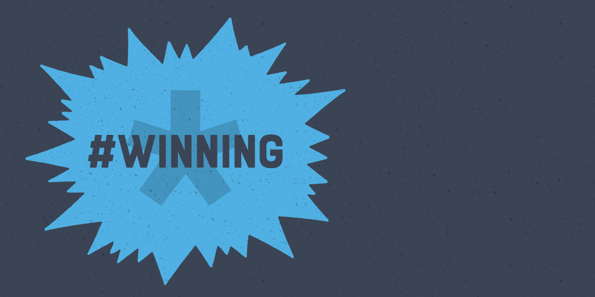 award logo - illustration of explosion bubble with text "winning"